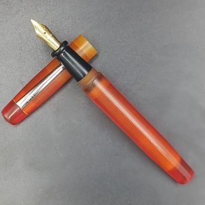 WOW Brand Model-1033A Nayam(sindoor Flame) நயம் 13/13mm Handmade Resin Transparent Orange Color Body and Cap No.5.5 Fine Tipped Silver Clip Eye Dropper Model Fountain Pen SKU 60261